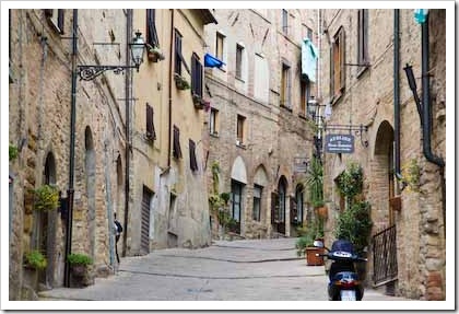 A steep, windy street in Volterra